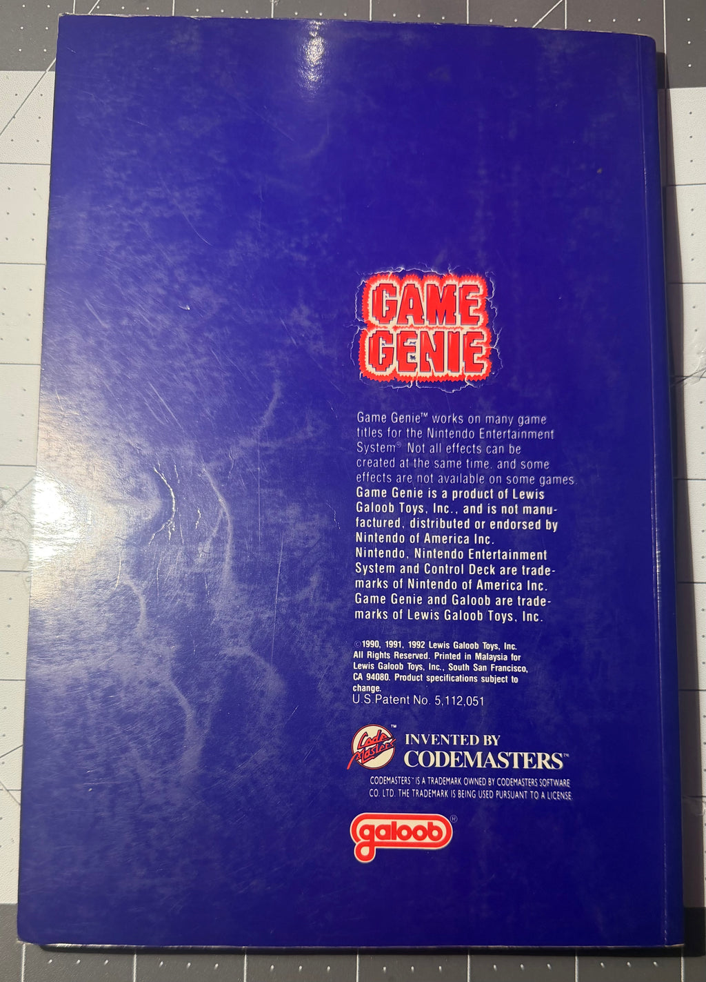Game Genie - Nintendo NES (Loose with Book)
